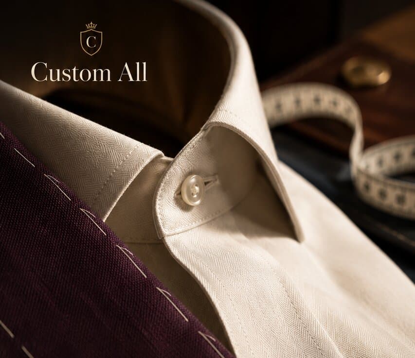 Custom tailoring — shirt collar detail with measuring tape